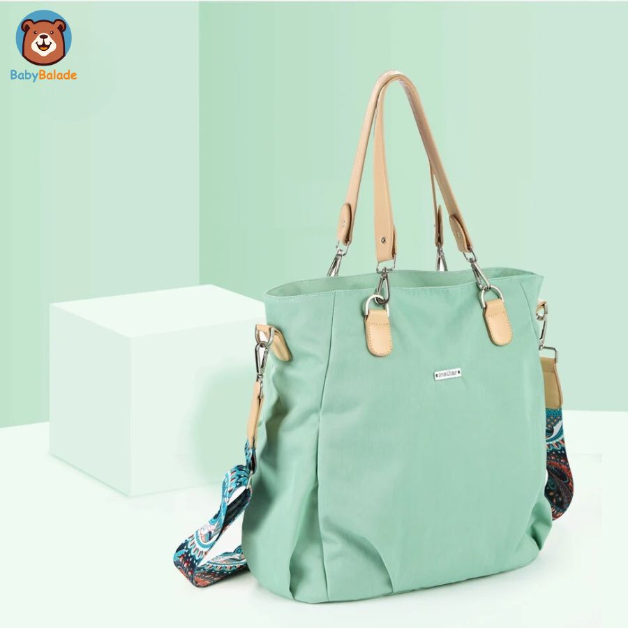 sac à langer bandoulière de couleur menthe