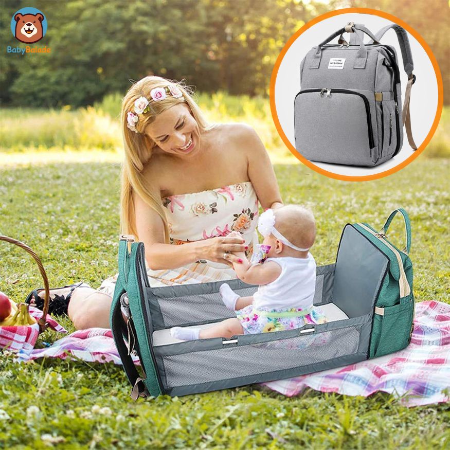 sac à langer bébé lit - sac à langer lit avec bébé et maman au parc